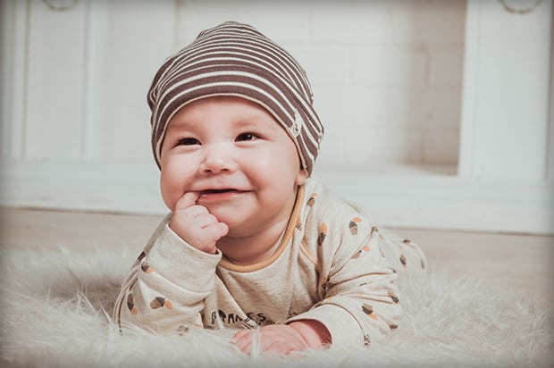 Baby Touching Gums