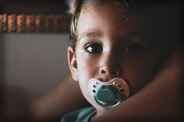 Child with Pacifier and Tears